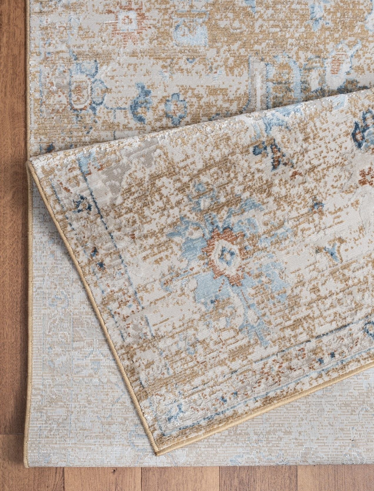 Noble - 7'10" X 10'3" Area Rug - Gold