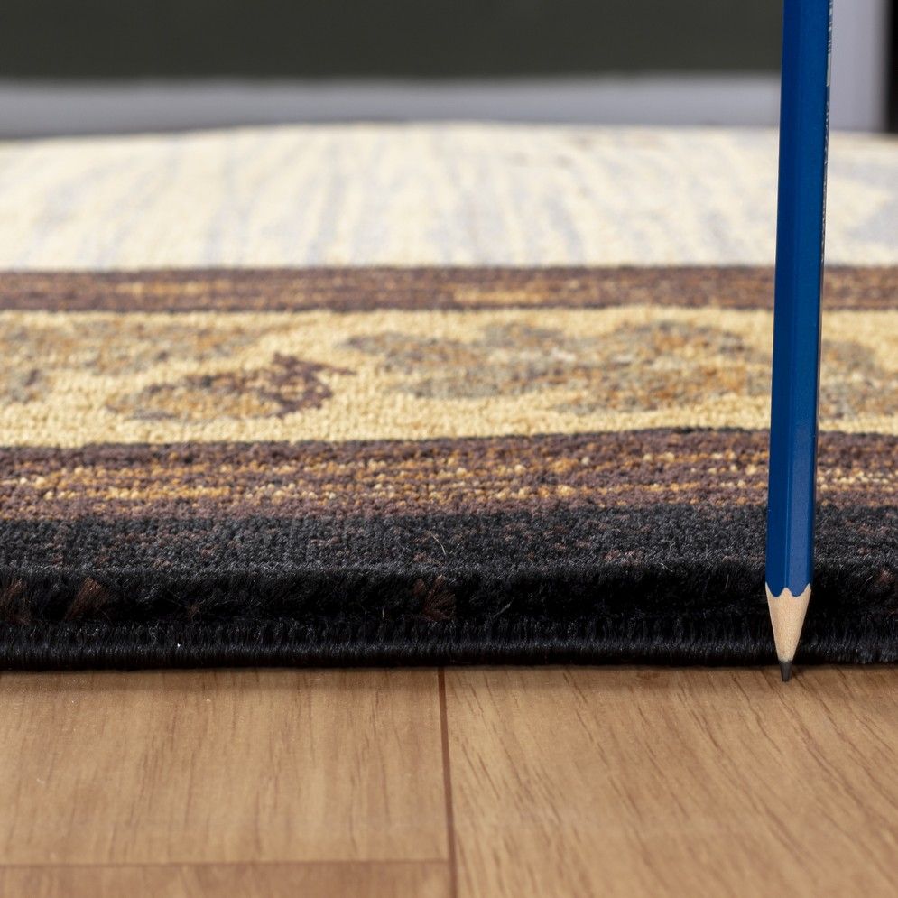 Nature's Nest - 7'10" X 10'3" Lodge Area Rug - Multi