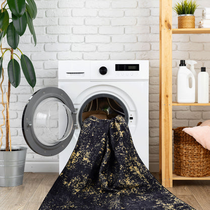 Maval - 5' X 8' Washable Area Rug - Black / Gold
