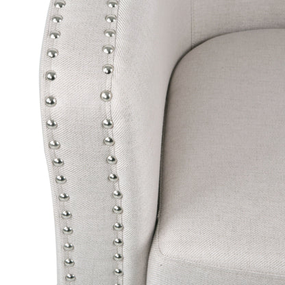 Riverbed - Upholstered Swivel Chair With Nailhead Trim And Sloped Arms - Wheat